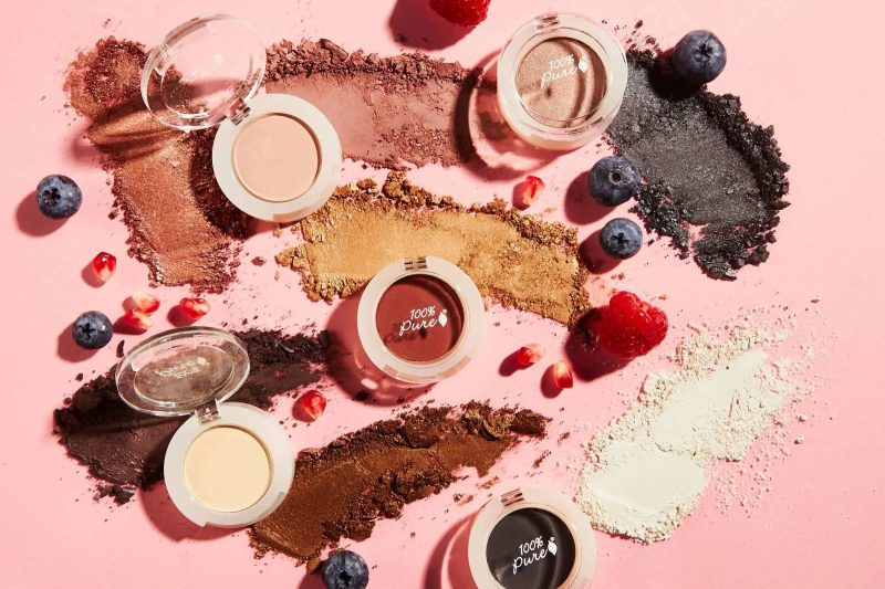 Discover the Benefits, Ingredients, and Innovations Behind 100% PURE’s Revolutionary Natural Makeup
<em>Posted on May 27, 2024</em> <em>Written by: 100% PURE®</em>
The Birth of Fruit Pigmented® Makeup
The journey of 100% PURE began with a simple yet groundbreaking discovery by Susie Wang, a renowned chemist and one of the brand’s co-founders. While picking berries in her garden, Susie noticed how the vibrant colors of the berries effortlessly stained her skin. This observation sparked an idea that would revolutionize the natural makeup industry: using fruit pigments as a natural and healthy alternative to synthetic dyes.
Together with co-founder Ric Kostick, Susie patented the use of fruit pigments in cosmetics, laying the foundation for 100% PURE’s extensive line of natural makeup products. This innovation not only provided a safer option for makeup enthusiasts but also infused their products with the nourishing benefits of fruits, vegetables, tea, coffee, and cocoa.
Why Fruit Pigments Matter
The use of fruit pigments in makeup is more than just a marketing gimmick. It’s a testament to 100% PURE’s commitment to creating products that are both effective and safe for your skin. Traditional makeup often relies on synthetic dyes and iron oxides, which can cause irritation, inflammation, and allergic reactions. In contrast, fruit pigments are packed with vitamins, antioxidants, and other nutrients that support skin health.
For example, pomegranate, a key ingredient in 100% PURE’s Fruit Pigmented® Pomegranate Oil Anti Aging Lipstick, is rich in vitamin C and has powerful staining properties. This not only provides a beautiful, long-lasting color but also helps treat skin roughness and flakiness. Similarly, avocado oil, used in the Bamboo Blur Matte Makeup, offers deep nourishment and helps create a foundation base that mimics the skin’s natural tone and texture.
By choosing makeup colored with fruit pigments, you’re not only enhancing your natural beauty but also protecting your skin from the harmful effects of <a href="https://www.100percentpure.com/blogs/feed/natural-vs-synthetic-skincare-what-s-the-difference">synthetic chemicals</a>. This makes 100% PURE’s products a smart choice for anyone looking to maintain healthy, radiant skin.
Exploring 100% PURE’s Fruit Pigmented® Product Range
100% PURE offers a diverse range of makeup products, each carefully crafted with specific fruit pigments to deliver stunning, vibrant colors. Here are some standout products and the fruits that give them their unique hues:
<a href="https://www.100percentpure.com/products/fruit-pigmented-pomegranate-oil-anti-aging-lipstick-poppy">Poppy Lipstick</a> – Pomegranate:
One of the star ingredients, pomegranate, is known for its deep, blood-red tones and high levels of vitamin C. This makes it perfect for creating the dramatic, rich shades in the Fruit Pigmented® Pomegranate Oil Anti Aging Lipstick in Poppy. Not only does this lipstick provide a beautiful red hue, but it also acts as an anti-aging treatment thanks to the nourishing properties of pomegranate oil.
<a href="https://www.100percentpure.com/collections/foundation-makeup/products/bamboo-blur-matte-makeup?variant=3429881184280">Bamboo Blur Matte Makeup</a> – Avocado and Peach:
The Bamboo Blur Matte Makeup combines avocado oil with pigments from peach, apricot, carrot, and tomato to create a foundation that offers multidimensional color and deep nourishment. Avocado oil serves as a rich base, enhancing skin elasticity and providing a natural, healthy glow.
<a href="https://www.100percentpure.com/products/maracuja-mascara-blackberry">Maracuja Mascara</a> and <a href="https://www.100percentpure.com/products/fruit-pigmented-cocoa-butter-matte-lipstick?variant=12495008956494">Oasis Matte Lipstick</a> – Blackberry:
Blackberries are packed with antioxidants, making them a dual-purpose ingredient in both mascara and lip products. The Maracuja Mascara uses blackberry pigments for a deep purple hue that nourishes lashes, while the Oasis Matte Lipstick delivers a sultry, berry-wine color that suits a variety of skin tones.
<a href="https://www.100percentpure.com/products/fruit-pigmented-lip-glaze-cabernet">Cabernet Lip Glaze</a> and <a href="https://www.100percentpure.com/products/lip-caramel-plum-wine">Plum Wine Lip Caramel</a> – Cabernet Grape:
Cabernet grapes provide the intense pigments for the Cabernet Lip Glaze and Plum Wine Lip Caramel. These products offer a sheer wash of color with undertones of deep red, blue, and pink, while also delivering the antioxidant benefits of grape skins to protect and rejuvenate your lips.
<a href="https://www.100percentpure.com/products/fruit-pigmented-pretty-naked-palette">Pretty Naked Palette</a> – Papaya:
The Pretty Naked Palette features a range of subtle yet rich hues created with pigments from fruits and vegetables, including papaya. Papaya’s unique yellowy-orange shade adds a natural glow to the palette, while its rejuvenating enzymes help brighten and cleanse the skin.
The Benefits of Switching to Natural Makeup
Switching to natural makeup, especially products formulated with fruit pigments, offers numerous benefits for your skin and overall health. Here are some key advantages:
Skin Health:
Fruit pigments are rich in vitamins, antioxidants, and other nutrients that nourish and protect your skin. Ingredients like pomegranate and avocado oil provide deep hydration, help maintain skin elasticity, and combat signs of aging.
Reduced Irritation:
Conventional makeup often contains synthetic dyes and chemicals that can irritate the skin, leading to inflammation, allergic reactions, and breakouts. Fruit pigments, on the other hand, are gentle and less likely to cause adverse reactions.
Environmental Impact:
Natural makeup products are generally more eco-friendly. 100% PURE sources its ingredients sustainably and avoids harmful chemicals that can damage the environment. By choosing natural makeup, you support a more sustainable and ethical beauty industry.
Ethical Production:
100% PURE is committed to cruelty-free practices. Our products are not tested on animals, and we use vegan ingredients whenever possible. This aligns with the values of consumers who prioritize ethical and humane practices in their purchasing decisions.
Multifunctional Benefits:
Many of 100% PURE’s products are designed to provide multiple benefits. For instance, our lipsticks not only offer beautiful color but also deliver anti-aging and moisturizing benefits. This means you get more value and functionality from each product.
FAQ – Your Questions About Fruit Pigmented® Makeup Answered
What exactly are fruit pigments, and how are they different from synthetic dyes?
Fruit pigments are natural colorants derived from fruits, vegetables, teas, and other plant-based sources. Unlike synthetic dyes, which are often petroleum-based and can cause skin irritation and other health issues, fruit pigments are rich in vitamins, antioxidants, and other nutrients that nourish and protect the skin. They provide vibrant, long-lasting colors without the harmful side effects of synthetic chemicals.
Are 100% PURE’s products suitable for sensitive skin?
Yes, 100% PURE’s products are formulated with natural ingredients that are gentle on the skin, making them ideal for those with sensitive skin. The absence of harsh chemicals, synthetic dyes, and artificial fragrances minimizes the risk of irritation and allergic reactions.
How do fruit pigments benefit my skin?
Fruit pigments are packed with skin-loving nutrients such as vitamins, antioxidants, and fatty acids. These ingredients help hydrate the skin, reduce inflammation, promote elasticity, and protect against environmental damage. For example, pomegranate pigments provide vitamin C and antioxidants that support skin health, while avocado oil delivers essential fatty acids that keep the skin plump and moisturized.
Can I achieve bold and vibrant looks with fruit pigmented makeup?
Absolutely! 100% PURE offers a wide range of products that deliver bold and vibrant colors using fruit pigments. From dramatic red lipsticks to deep purple mascaras and richly pigmented eyeshadow palettes, you can achieve any look you desire without compromising on the health of your skin.
Are 100% PURE’s products environmentally friendly?
Yes, 100% PURE is dedicated to sustainability and environmentally friendly practices. We source our ingredients responsibly, use recyclable packaging, and avoid harmful chemicals that can damage the environment. By choosing 100% PURE, you’re supporting a brand that prioritizes the health of both your skin and the planet.
Ready to experience the transformative power of fruit pigments for yourself? Explore 100% PURE’s extensive range of natural makeup products and discover how these innovative formulas can enhance your beauty routine while promoting healthier skin. Whether you’re looking for a bold new lip color, a nourishing foundation, or a complete makeup palette, 100% PURE has you covered with products that are as good for your skin as they are for the environment. Make the switch today and see the difference that fruit pigments can make! Transforming Beauty with 100% PURE’s Fruit Pigmented® Makeup